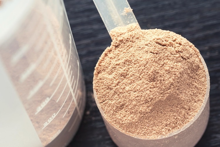 Scoop of whey protein powder