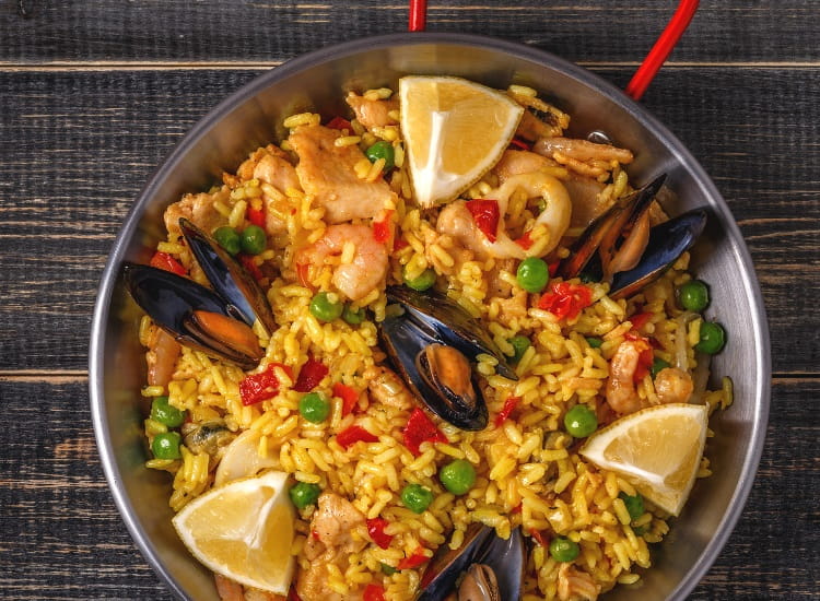 Paella with saffron in a pan