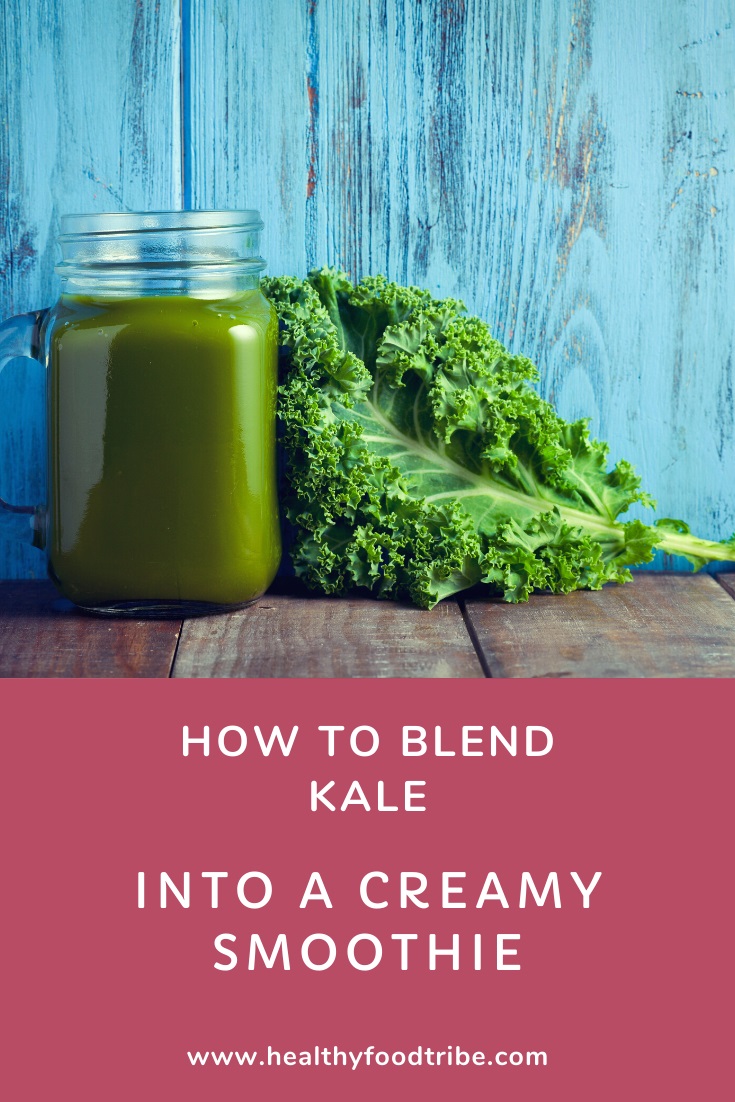 Blending kale into a creamy smoothie