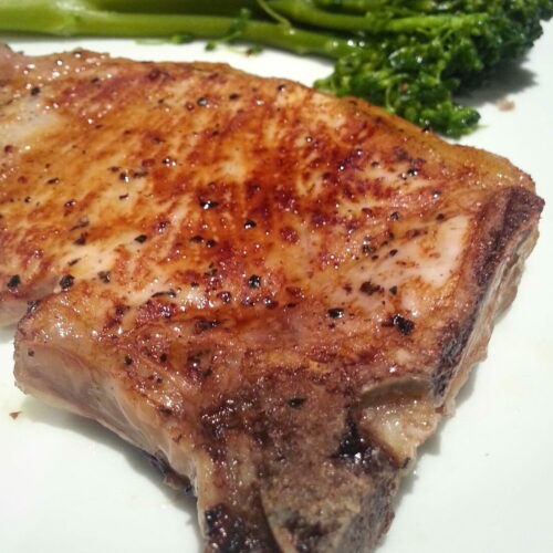 Oven baked bone-in pork chops with seasoning