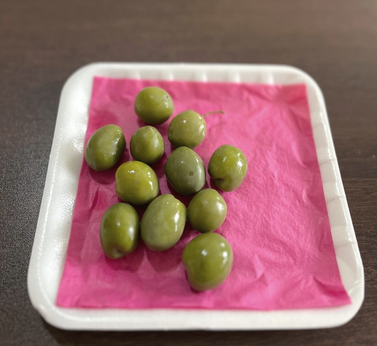 Castelvetrano olives on tray