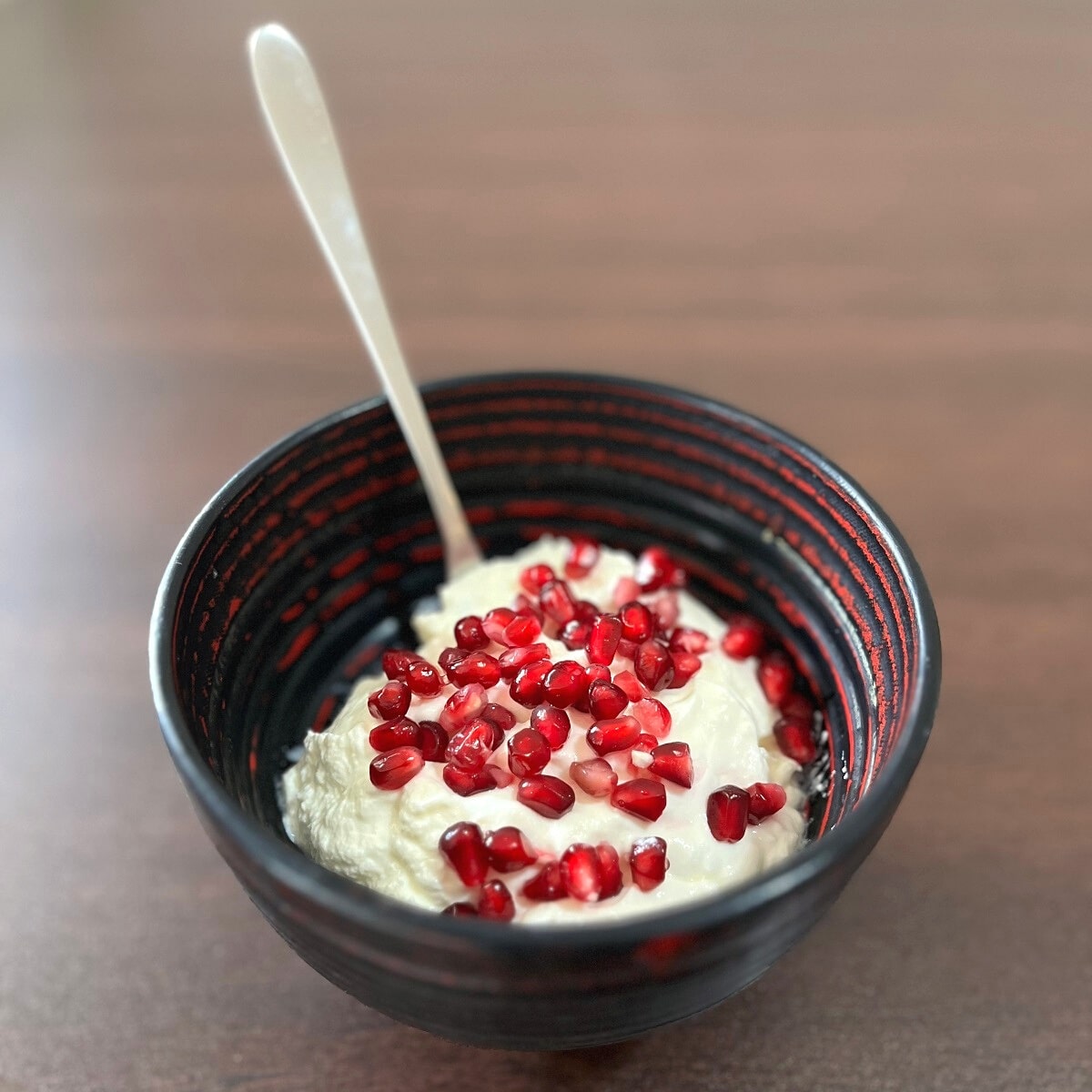 Yogurt with pomegranate seeds
