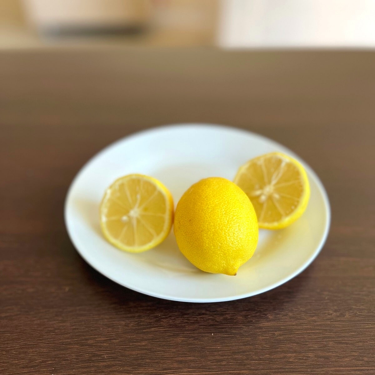 Sliced lemons on plate